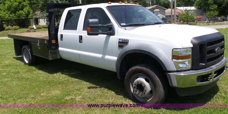 image for item L7062 2008 Ford F550 Super Duty Crew Cab flatbed truck