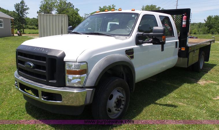 image for item L7062 2008 Ford F550 Super Duty Crew Cab flatbed truck