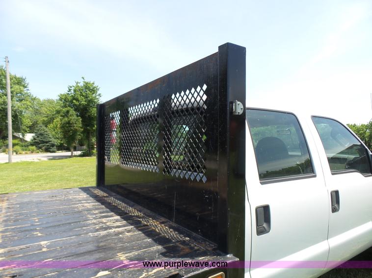 image for item L7062 2008 Ford F550 Super Duty Crew Cab flatbed truck