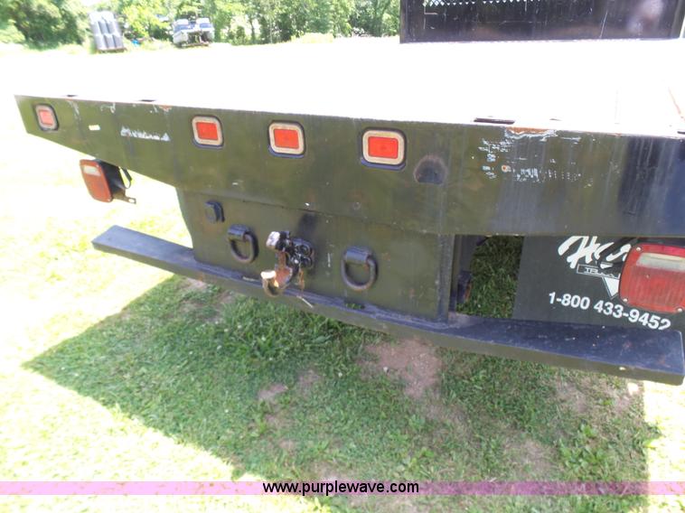 image for item L7062 2008 Ford F550 Super Duty Crew Cab flatbed truck