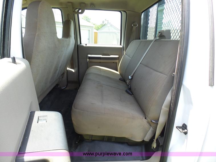 image for item L7062 2008 Ford F550 Super Duty Crew Cab flatbed truck