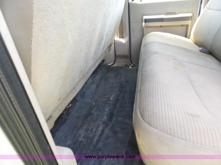 image for item L7062 2008 Ford F550 Super Duty Crew Cab flatbed truck