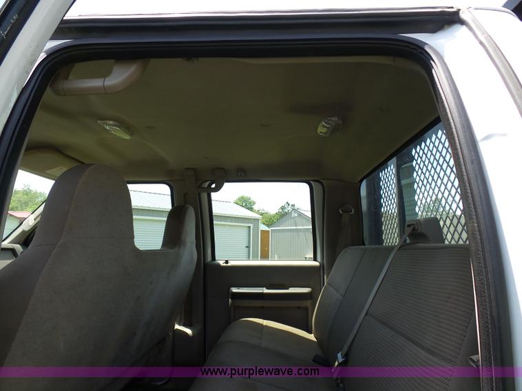 image for item L7062 2008 Ford F550 Super Duty Crew Cab flatbed truck