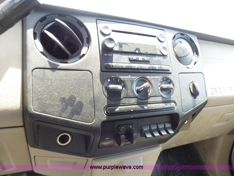 image for item L7062 2008 Ford F550 Super Duty Crew Cab flatbed truck