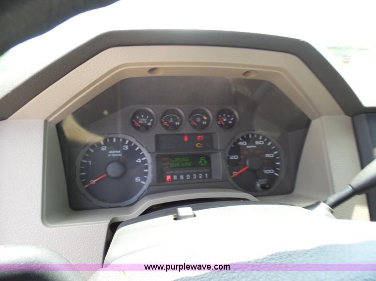 image for item L7062 2008 Ford F550 Super Duty Crew Cab flatbed truck