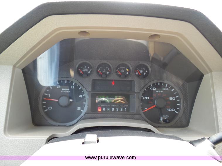 image for item L7062 2008 Ford F550 Super Duty Crew Cab flatbed truck