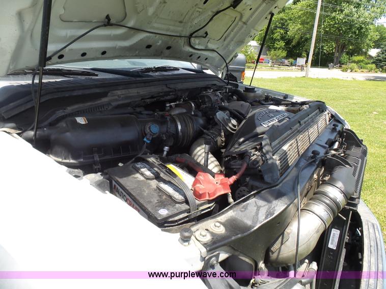 image for item L7062 2008 Ford F550 Super Duty Crew Cab flatbed truck