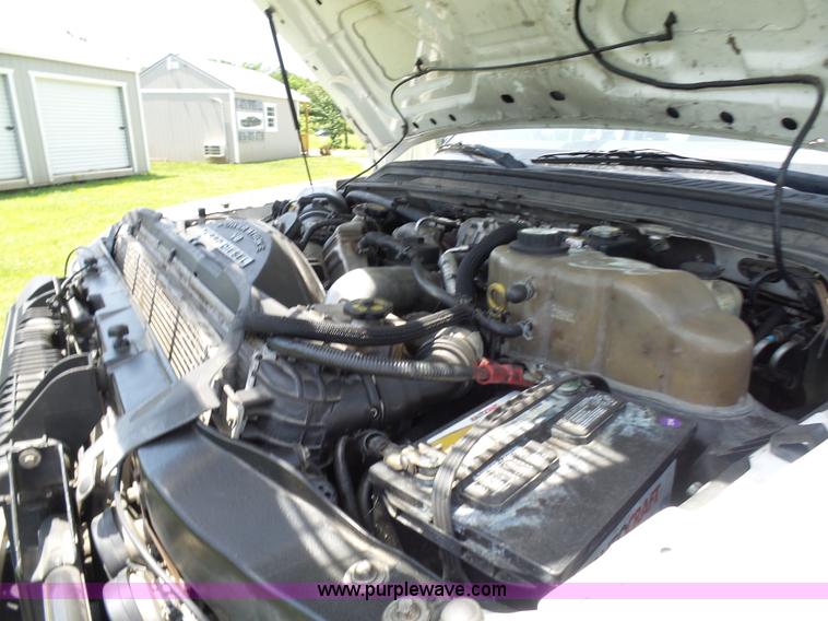 image for item L7062 2008 Ford F550 Super Duty Crew Cab flatbed truck