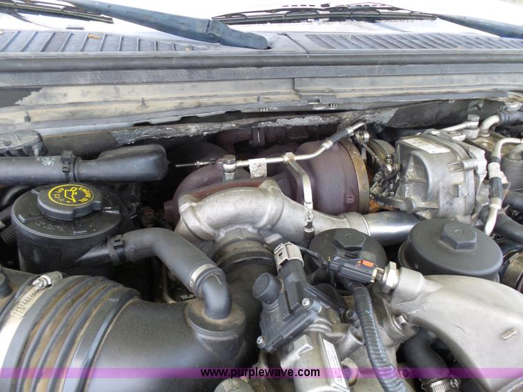 image for item L7062 2008 Ford F550 Super Duty Crew Cab flatbed truck