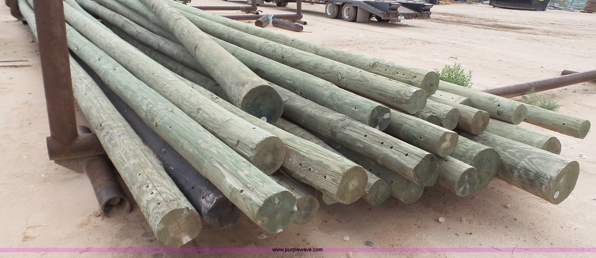 Approximately 29 45' class 5 telephone poles in Midland, TX Item BZ9132 sold Purple Wave