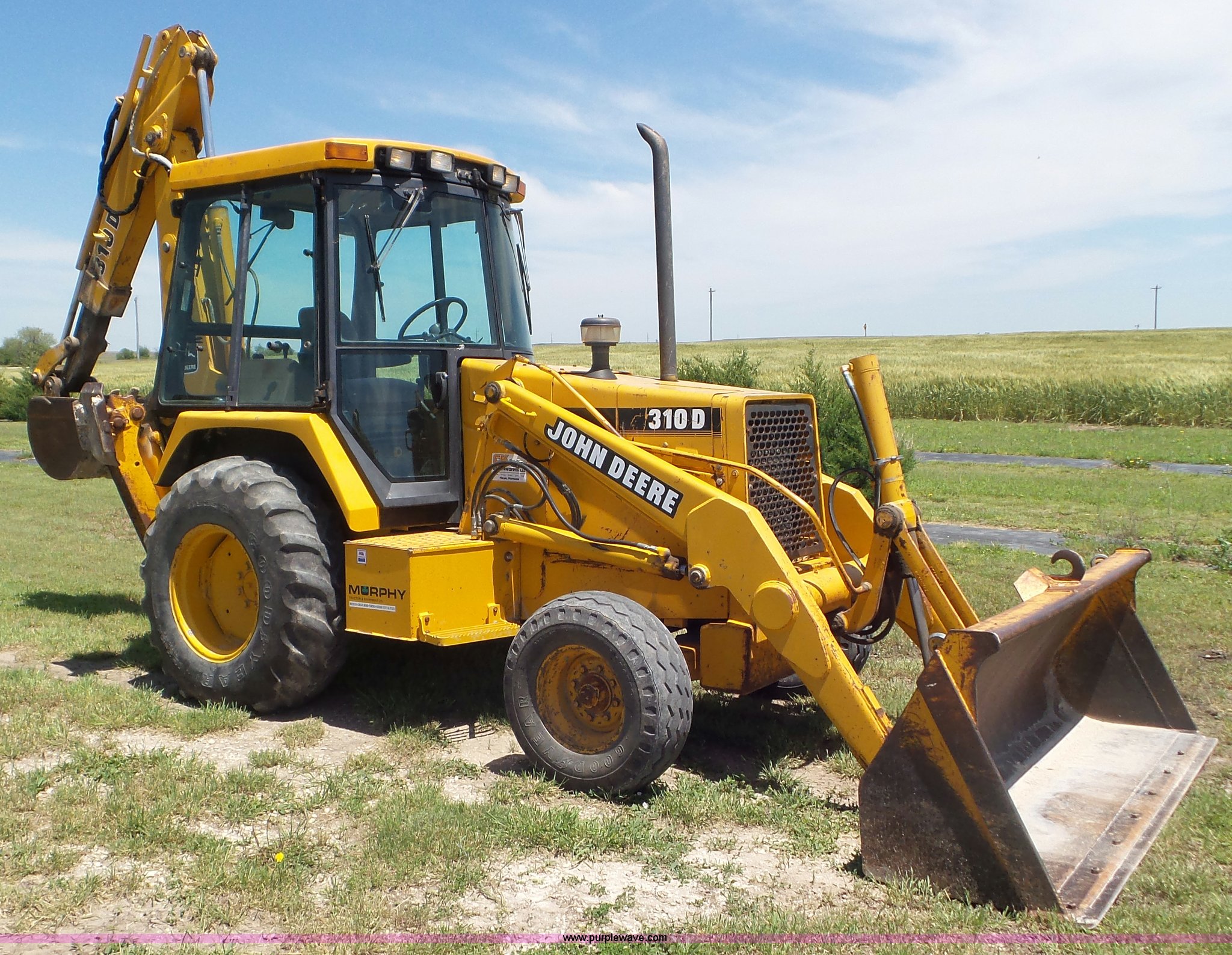 1991 John Deere 310D backhoe in Hays, KS Item L2005 sold Purple Wave