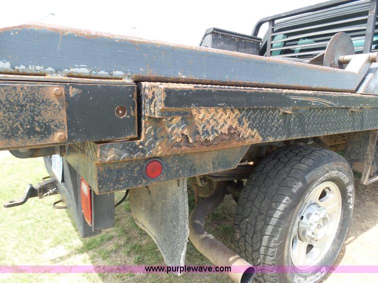 image for item AR9358 2006 Ford F350 Super Duty XL SuperCab flatbed pickup truck