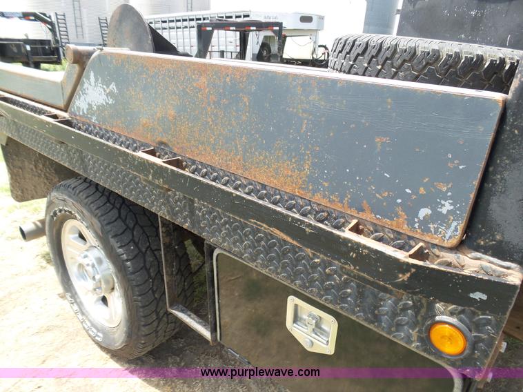 image for item AR9358 2006 Ford F350 Super Duty XL SuperCab flatbed pickup truck