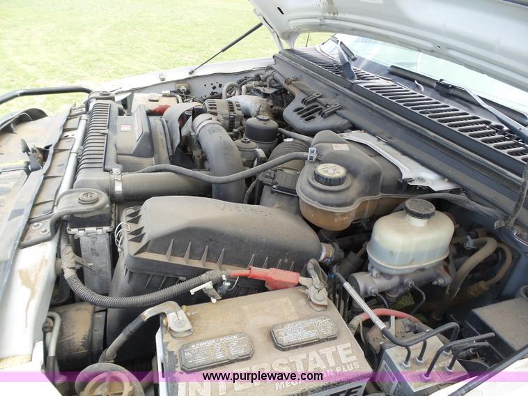 image for item AR9358 2006 Ford F350 Super Duty XL SuperCab flatbed pickup truck