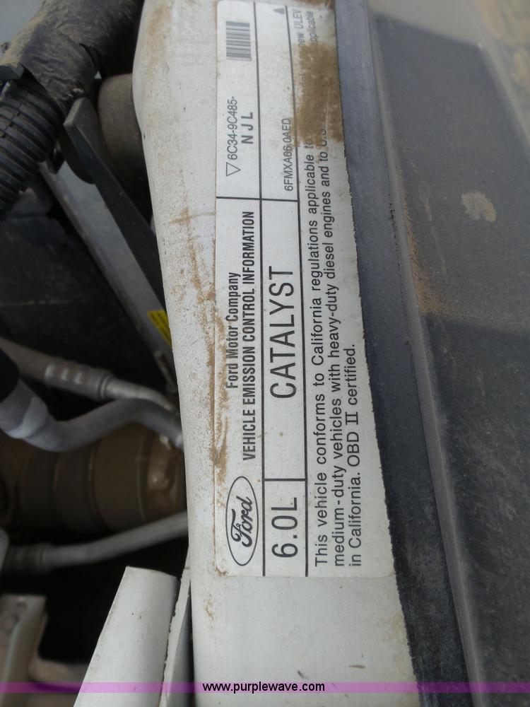 image for item AR9358 2006 Ford F350 Super Duty XL SuperCab flatbed pickup truck