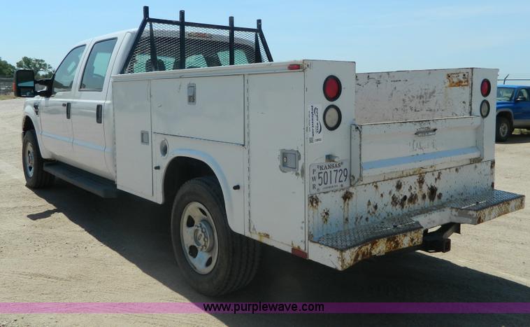 image for item J8892 2008 Ford F350 Super Duty Crew Cab utility truck
