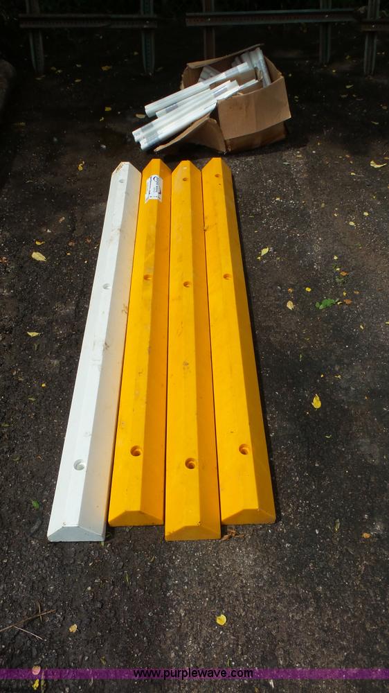 (4) poly parking curbs and traffic markers in Arnold, MO Item K1439