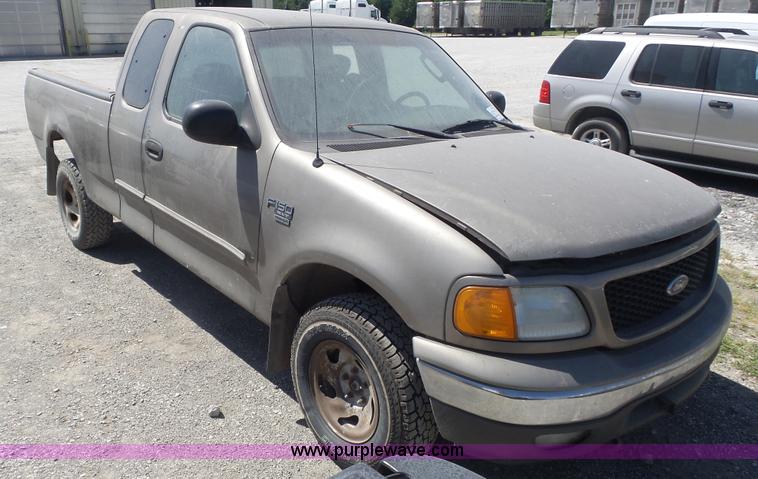 image for item K7740 2004 Ford F150 XLT Ext. Cab pickup truck
