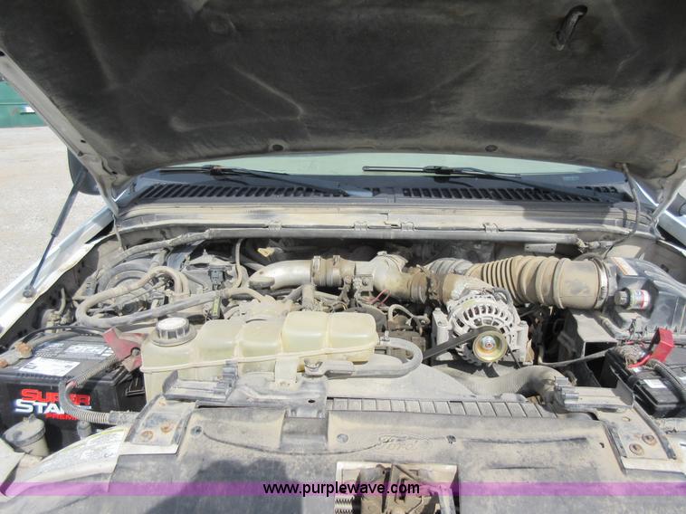 image for item L2796 1999 Ford F350 Super Duty SuperCab flatbed pickup truck