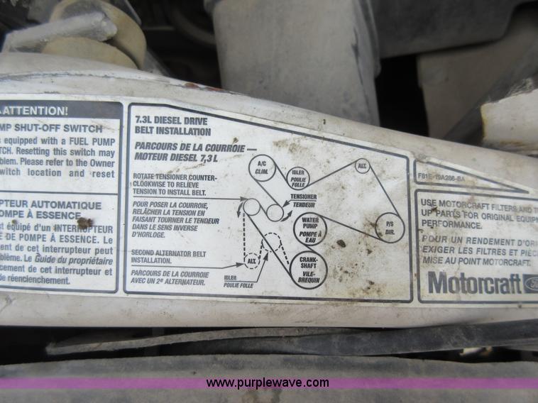 image for item L2796 1999 Ford F350 Super Duty SuperCab flatbed pickup truck