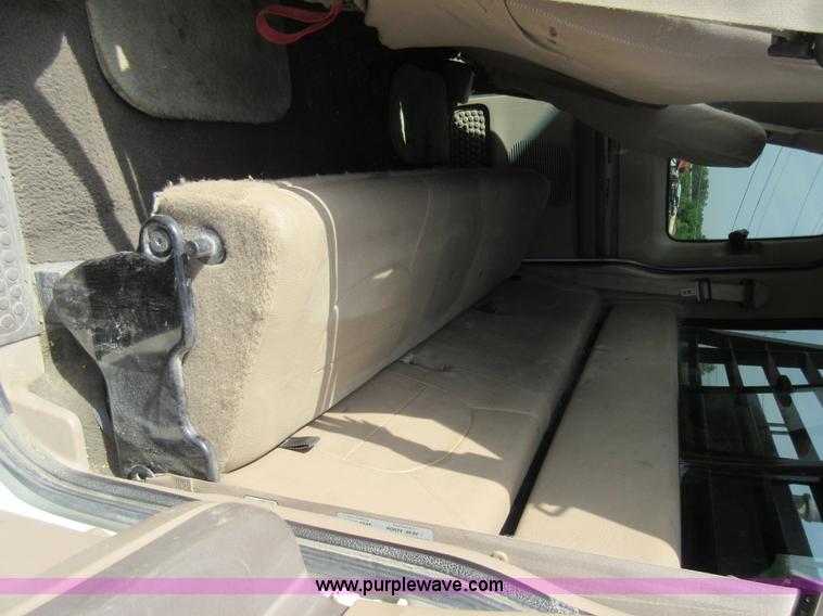 image for item L2796 1999 Ford F350 Super Duty SuperCab flatbed pickup truck