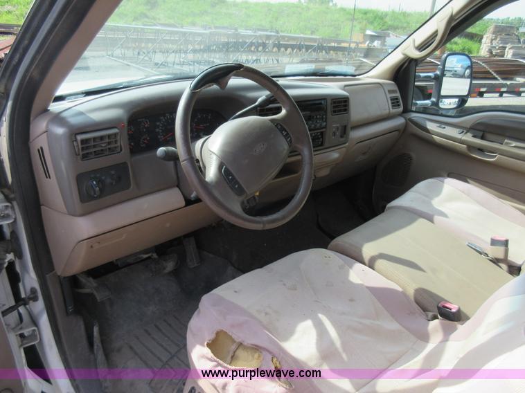 image for item L2796 1999 Ford F350 Super Duty SuperCab flatbed pickup truck