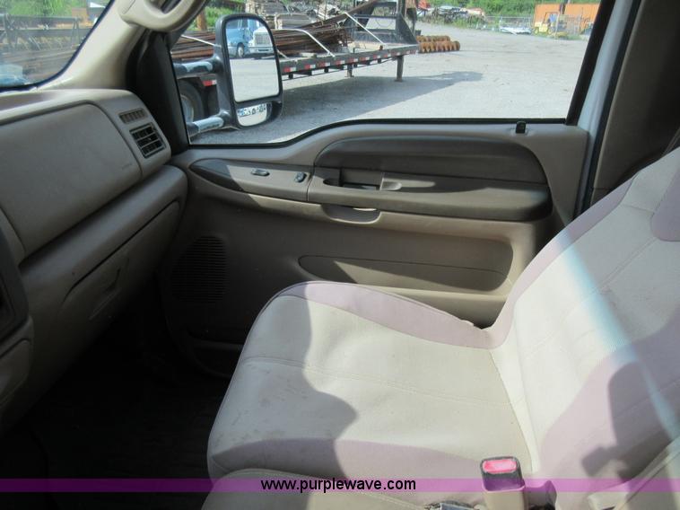 image for item L2796 1999 Ford F350 Super Duty SuperCab flatbed pickup truck