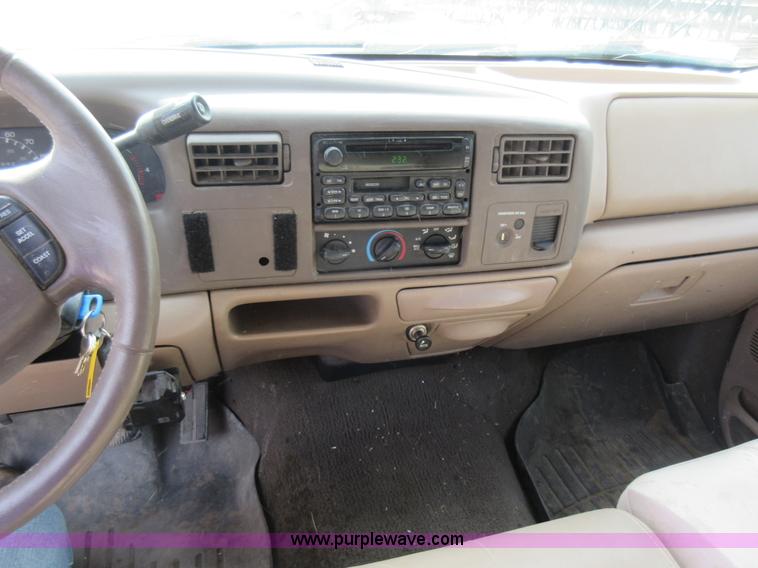 image for item L2796 1999 Ford F350 Super Duty SuperCab flatbed pickup truck