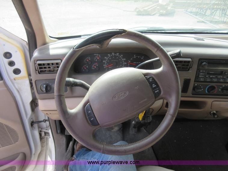 image for item L2796 1999 Ford F350 Super Duty SuperCab flatbed pickup truck