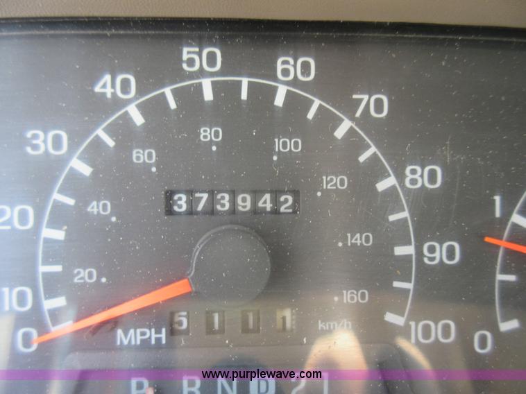 image for item L2796 1999 Ford F350 Super Duty SuperCab flatbed pickup truck