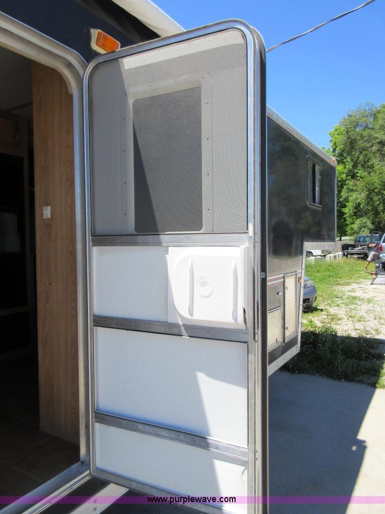 image for item L2827 2009 Forest River Work & Play toy hauler trailer