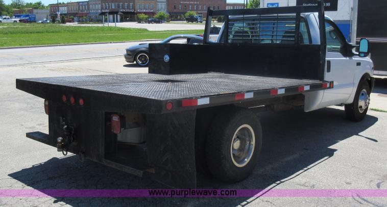 image for item L2828 2000 Ford F350 Super Duty flatbed pickup truck