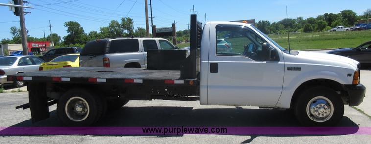 image for item L2828 2000 Ford F350 Super Duty flatbed pickup truck