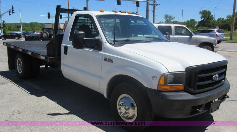 image for item L2828 2000 Ford F350 Super Duty flatbed pickup truck