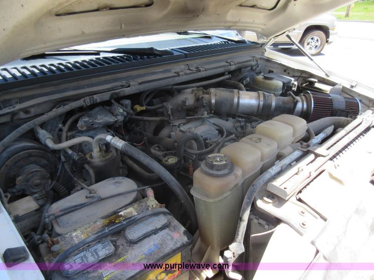 image for item L2828 2000 Ford F350 Super Duty flatbed pickup truck