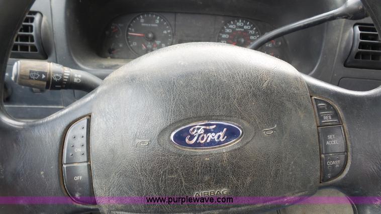 image for item L4807 2006 Ford F450 flatbed truck