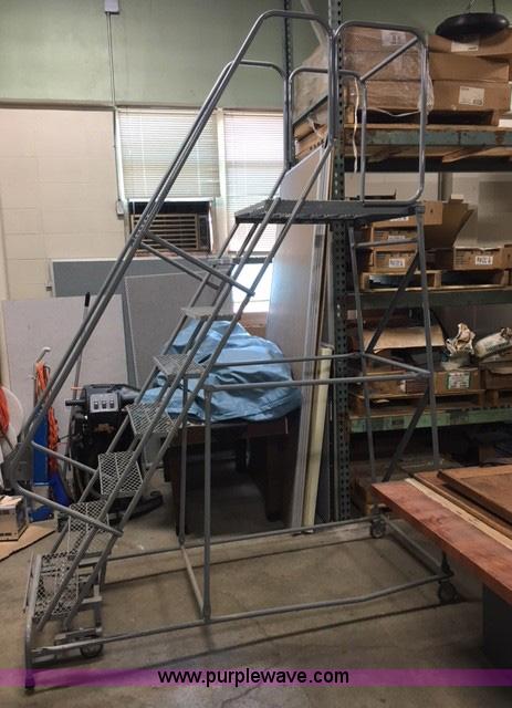 image for item F1466 Eight step rolling ladder