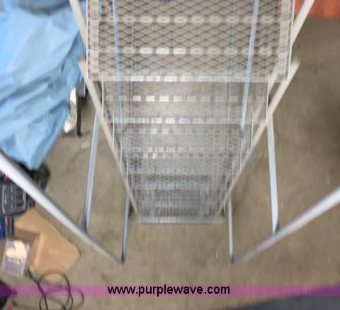 image for item F1466 Eight step rolling ladder