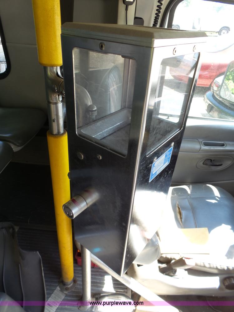 image for item J4075 2003 Ford E350 Super Duty shuttle bus