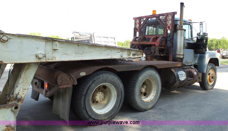 image for item K5498 1981 Mack R686ST semi truck with equipment trailer