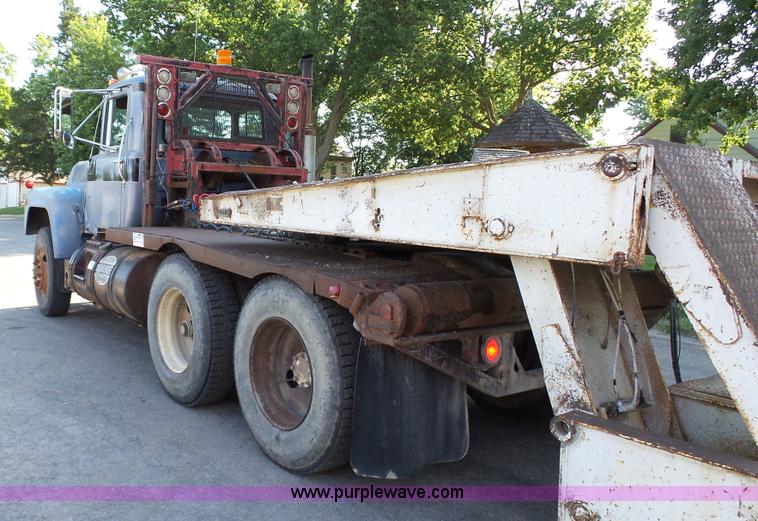 image for item K5498 1981 Mack R686ST semi truck with equipment trailer