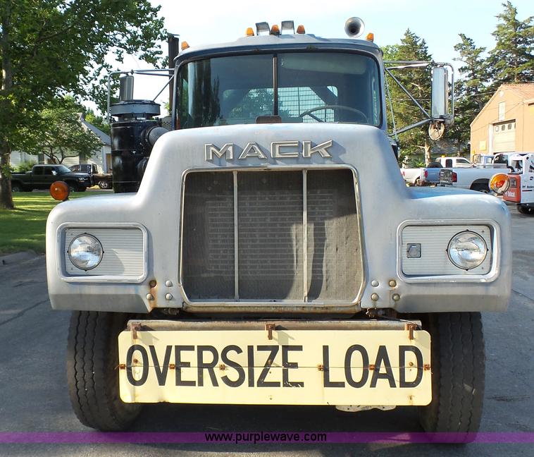 image for item K5498 1981 Mack R686ST semi truck with equipment trailer