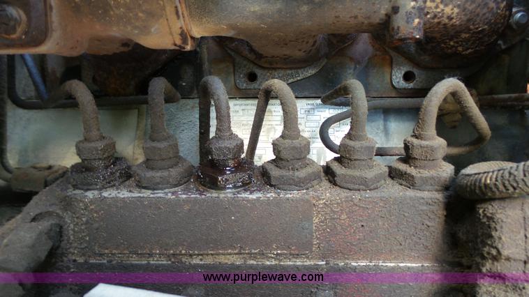 image for item K5498 1981 Mack R686ST semi truck with equipment trailer