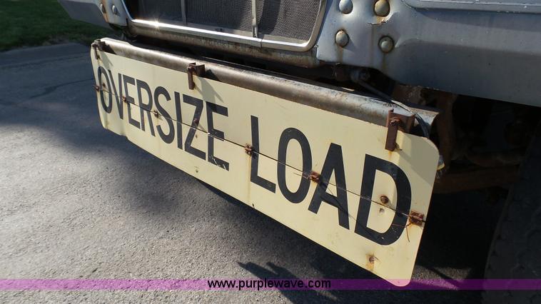 image for item K5498 1981 Mack R686ST semi truck with equipment trailer