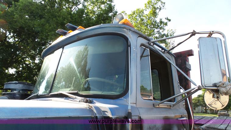 image for item K5498 1981 Mack R686ST semi truck with equipment trailer