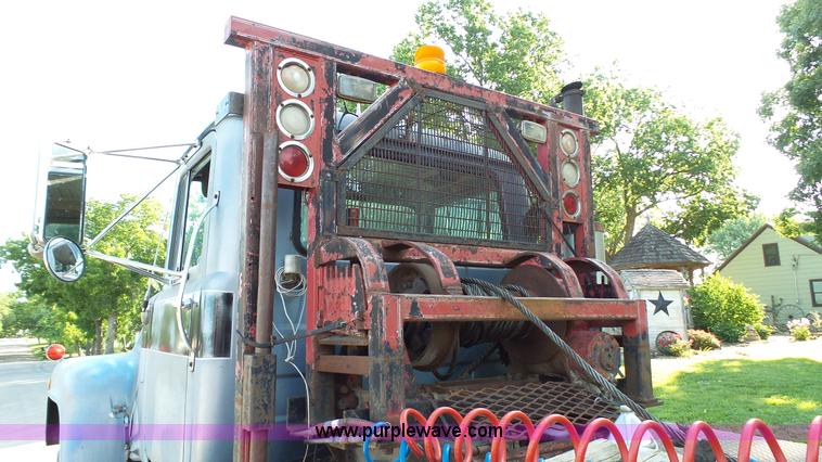 image for item K5498 1981 Mack R686ST semi truck with equipment trailer