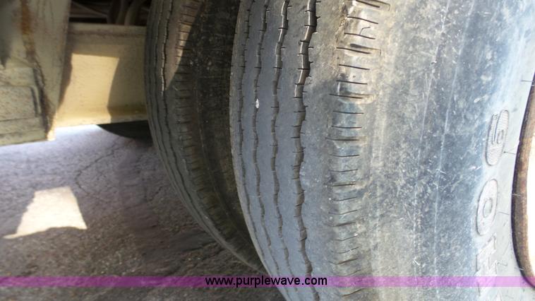 image for item K5498 1981 Mack R686ST semi truck with equipment trailer