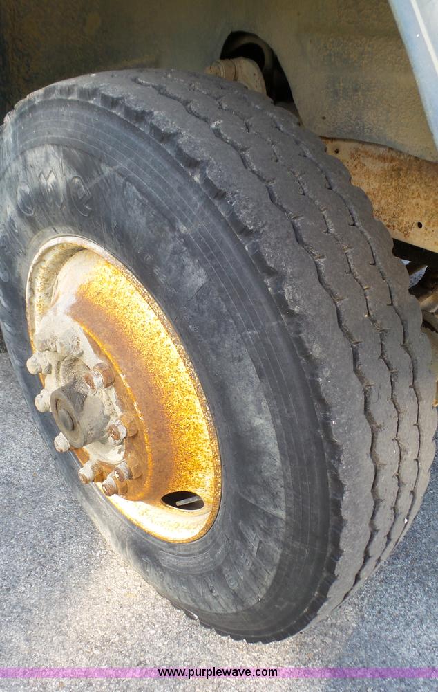 image for item K5498 1981 Mack R686ST semi truck with equipment trailer