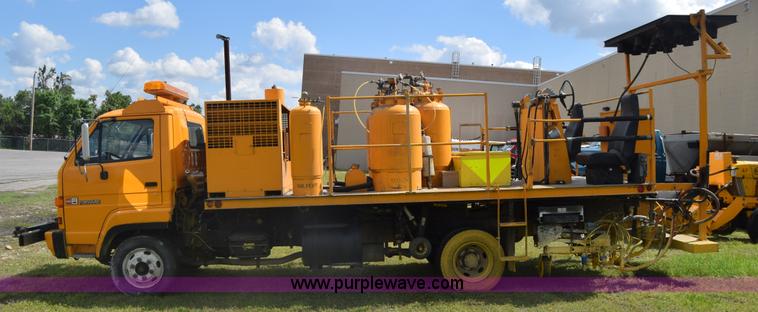 image for item K6534 1994 GMC W5 paint striper truck