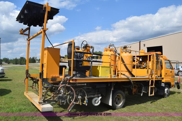 image for item K6534 1994 GMC W5 paint striper truck